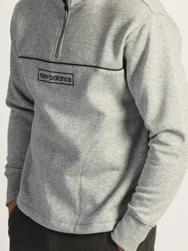 NEW BALANCE ESSENTIALS QUARTER ZIP